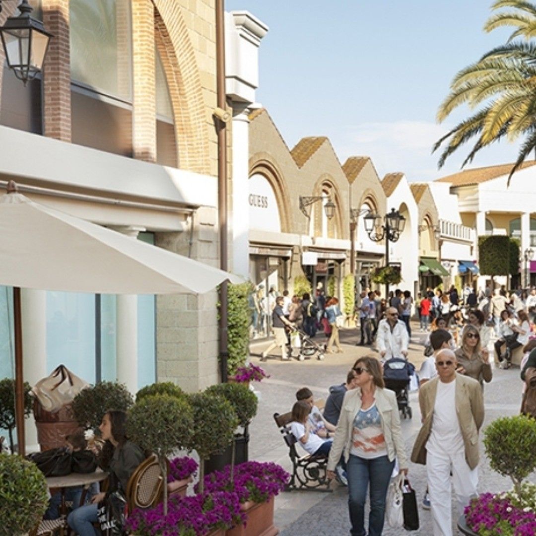 Castel Romano Designer Outlet — private shopping transfer from Rome
